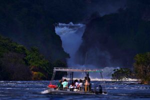 Uganda travel. Murchison Falls, waterfall between Lake Kyoga and Lake Albert on the Victoria Nile in Uganda. Africa river Landscape.